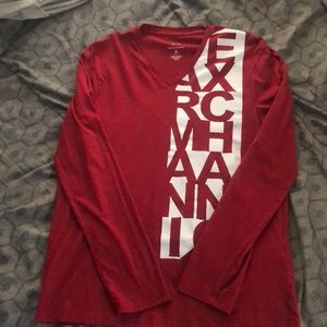 An Armani exchange red long sleeve shirt